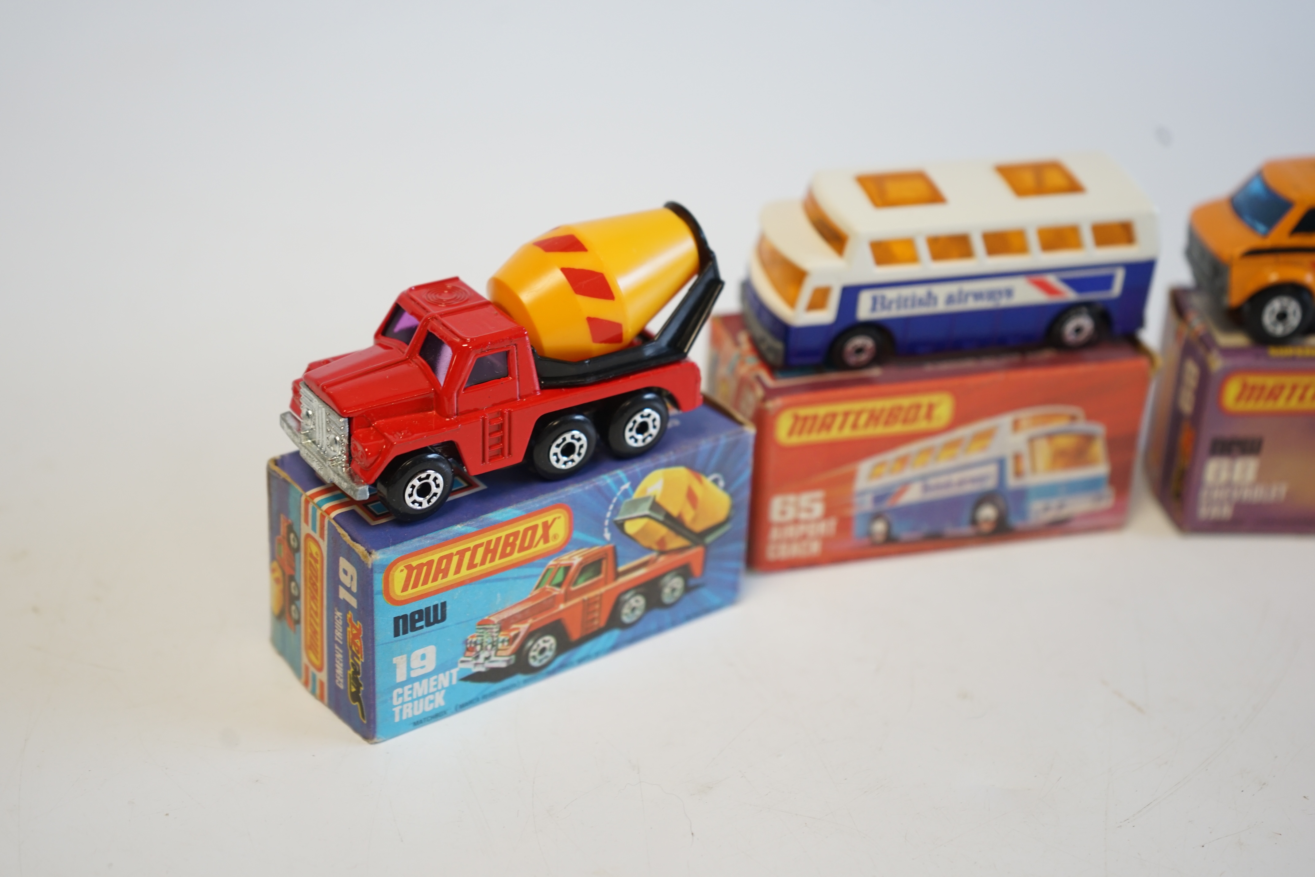 Sixteen boxed Matchbox Series 1-75 diecast vehicles including; 14; Petrol Tanker and another, 19; Cement Truck, 28; Formula Racing Car and another, 35; Zoo Truck, 36; Refuse Truck, 46; Mercedes 300 SE coupe, 63; Freeway